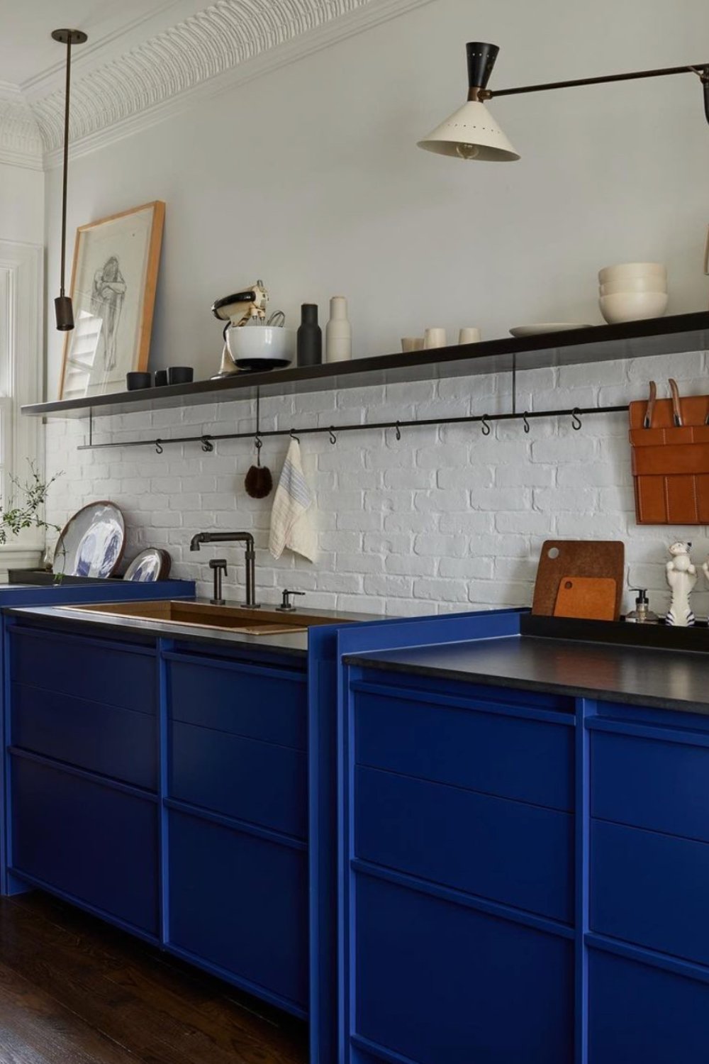 Bold Blue Cabinets with Minimalist Black Hardware
