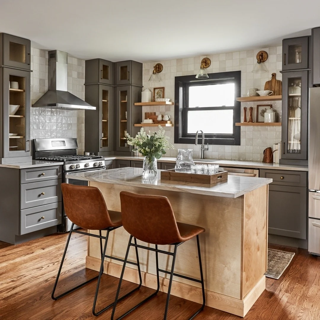Natural Wood Island Base Adds Warmth to Dark Cabinetry