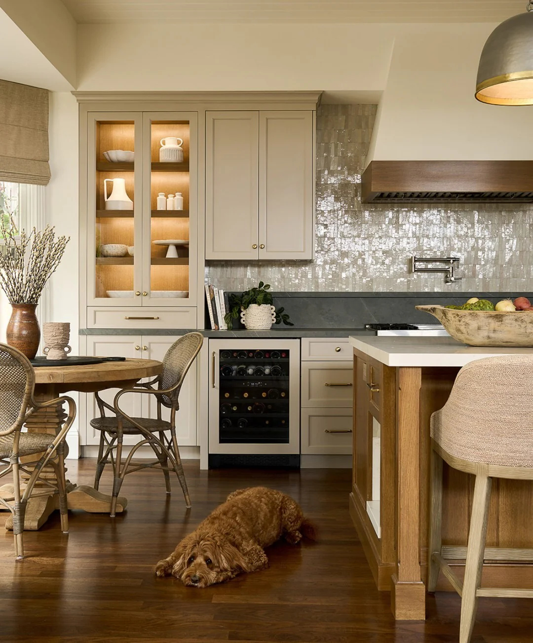 Glass-Front Cabinets Showcase Warmly Lit Display Shelves