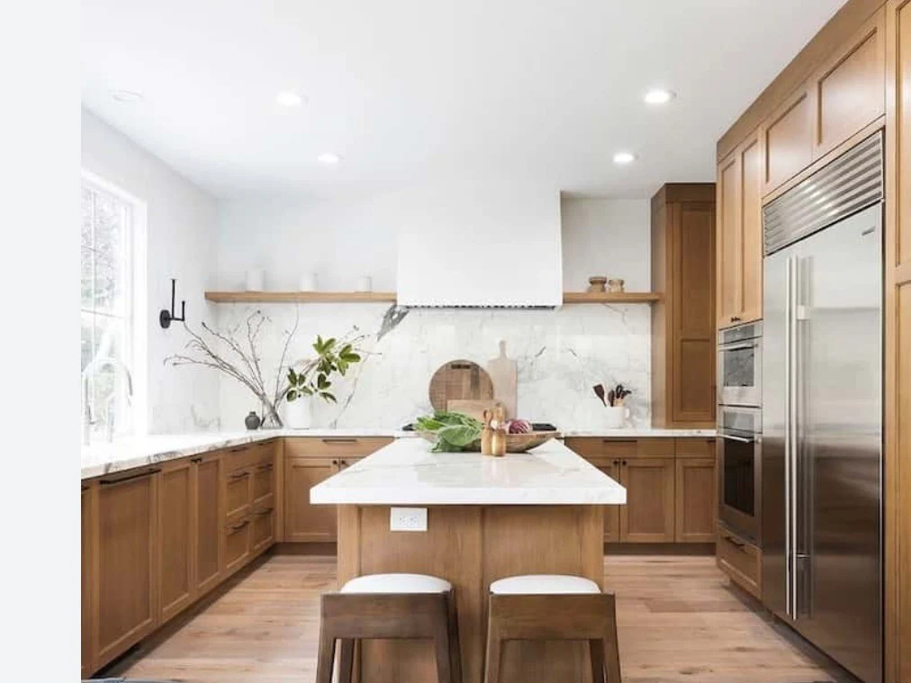 Marble Slab Backsplash Adds Natural Texture Behind Island
