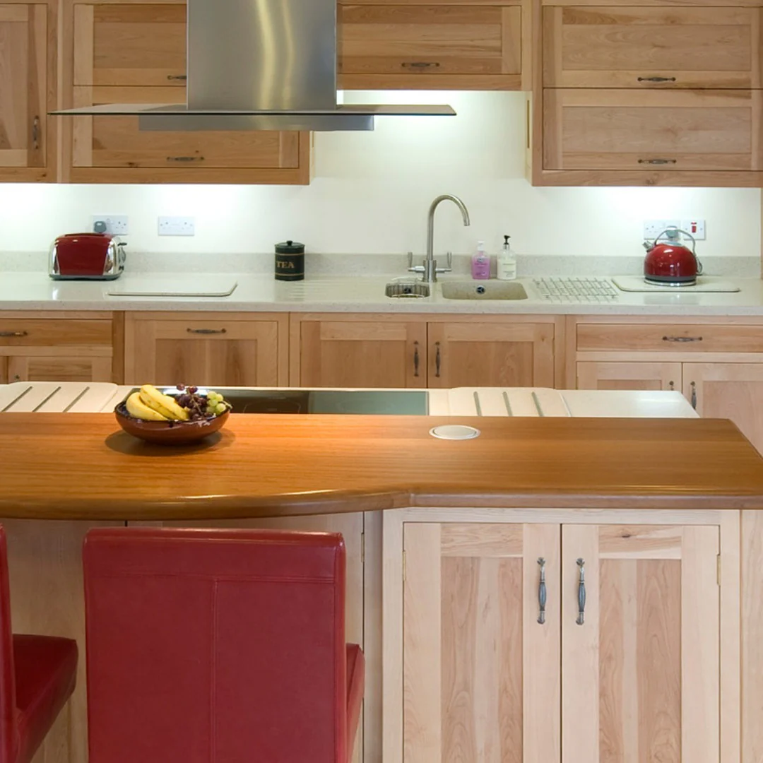 Curved Wood Countertop Adds a Soft Touch to Kitchen Island