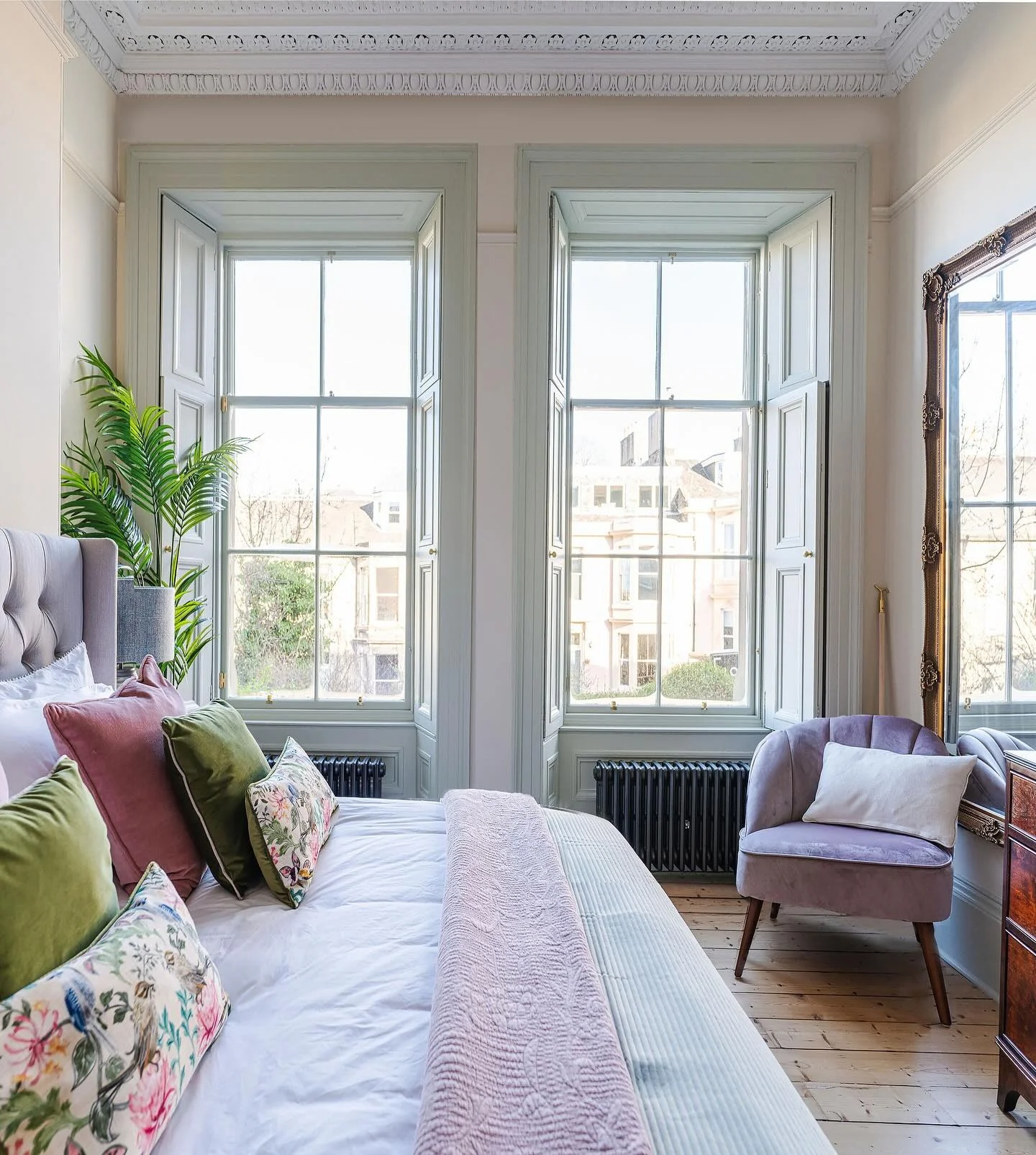 Amplify Light with a Tall Ornate Gold Mirror