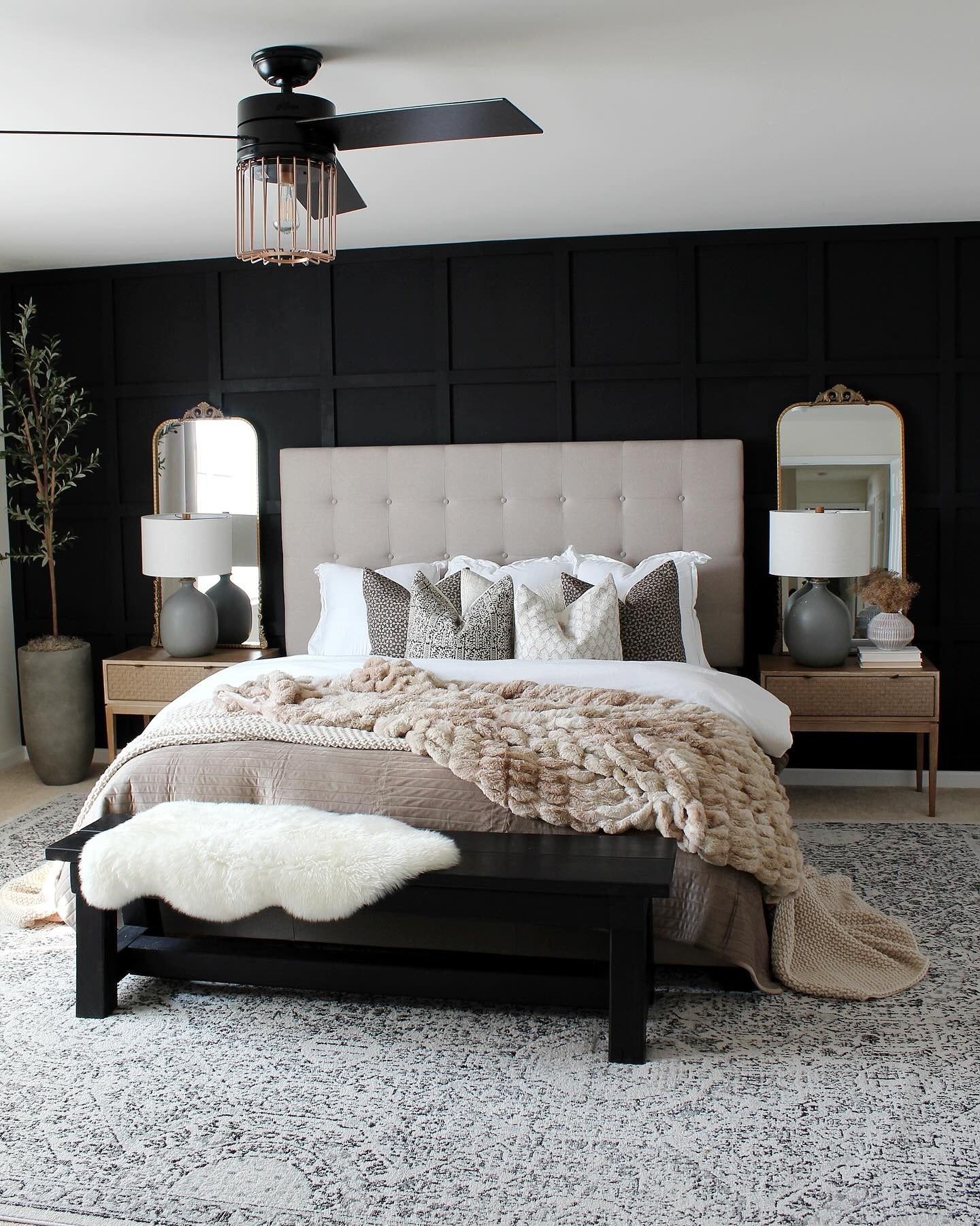 Black Paneled Wall Creates a Dramatic Backdrop