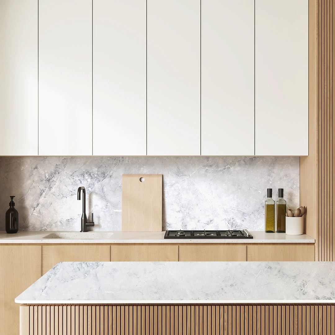 Wood Cutting Board Adds Natural Warmth to Marble Backsplash